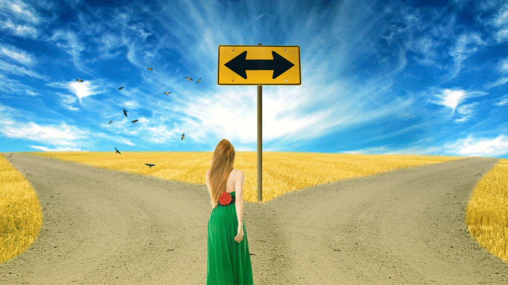 A symbolic image of a person standing at a crossroads, representing a life turning point and the choice to change direction.